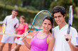 Tennis couple playing doubles