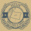 Grunge rubber stamp with name and map of Oregon, USA