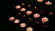 Candles at an alter being blown out