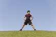 Athlete male in the grass