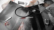 Syringe falling over x ray beside medical tools in black and white