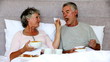 Mature couple enjoying their breakfast together