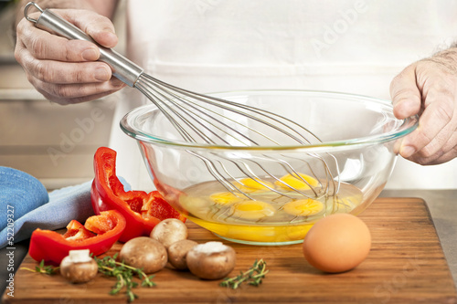 Photo: Whisking eggs in bowl Whisking eggs in bowl