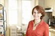 Foto: Happy woman in kitchen at home Happy woman in kitchen at home