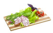 Sausages with salad and basil