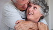 Sweethearts embracing and laughing each other