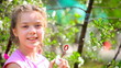 little girl with soap bubbles