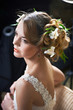 Hairstyle beauty girl woven with flowers lily