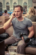 Photo: Busy photographer talking on cell phone Busy photographer talking on cell phone
