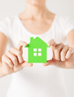 woman hands holding green house
