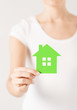 woman hands holding green house