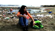 Video: Young woman sad not being able to clean dirty beach Young woman sad not being able to clean dirty beach