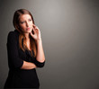 Beautiful woman thinking with empty copy space