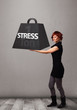 Young woman holding one ton of stress weight