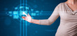 Woman pressing high tech type of modern buttons