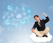 Photo: Happy businessman sitting on cloud with cloud computing Happy businessman sitting on cloud with cloud computing