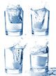 Photo: Ice in glass of water with splash set on white background . Ice in glass of water with splash set on white background .