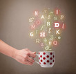 Coffee cup with colorful letters