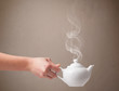 Tea pot with abstract white steam