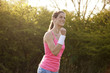 Happy young woman jogging