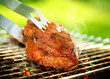 Foto: Flames Grilling a Steak on the BBQ. Grill Beef Steak Barbeque Flames Grilling a Steak on the BBQ. Grill Beef Steak Barbeque