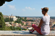 Girl looking to Verona town, Italy