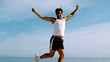 Sportsman jumping on the beach