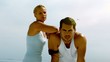 Exhausted athletes on the beach