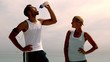 Attractive sportsman drinking water