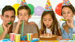 Happy family celebrating their daughter birthday