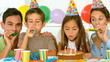 Smiling family celebrating their daughter birthday