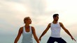 Man and woman doing yoga on beach together