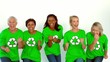 Women wearing green shirt with environment symbol dancing