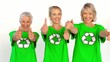 Three enviromental activists giving thumbs up