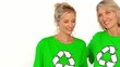 Two women wearing green shirt for the environment