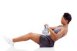 young african woman working out using kettle bell
