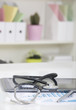 Doctor office table desk and black chair with stethoscope  and w