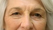 Old woman winking an eye
