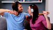 Couple listening to music and acting silly