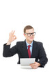 Happy businessman showing ok sign holding tablet computer