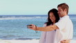 Attractive couple taking a self portrait