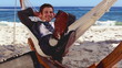 Buisnessman relaxing in hammock