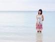 beautiful asian woman in the sea