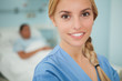 Close up of a blonde nurse smiling