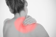 Woman rubbing shoulder pain