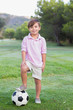 Portrait of boy with football