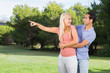 Woman pointing something out to partner