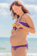 Photo: pregnant beach female pregnant beach female