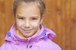little girl in pink coat