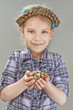 little girl with quail eggs
